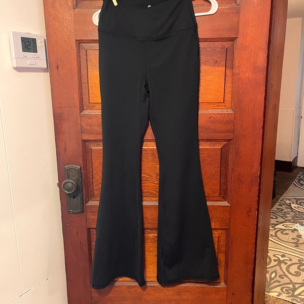 Size Medium soft flare leggings by 90 Degrees with cross waist